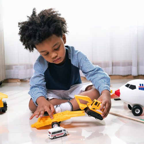 happy-black-people-african-american-child-play-truck-airplane-toy-home-scaled-1.jpg